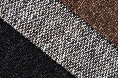 Parlak topçu tekstil örnekleri koleksiyonu. Çoklu renkli kumaş dokusu arkaplanı. Üst görünüm.