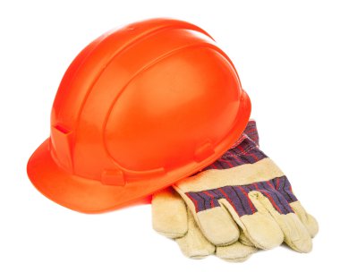 Bir inşaat şapka ve beyaz bitti izole ağır eldiven
