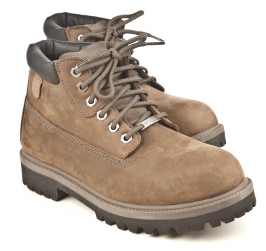 Beyaz bir arka plan üzerinde izole kahverengi dağ ayakkabıları