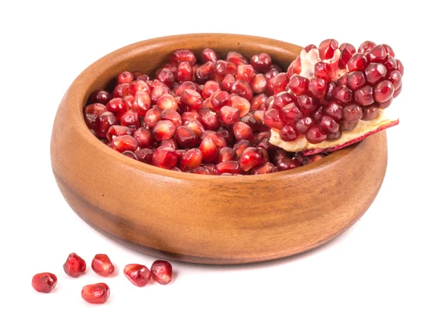 Pomegranate seeds in a bamboo cup — Stock Photo, Image
