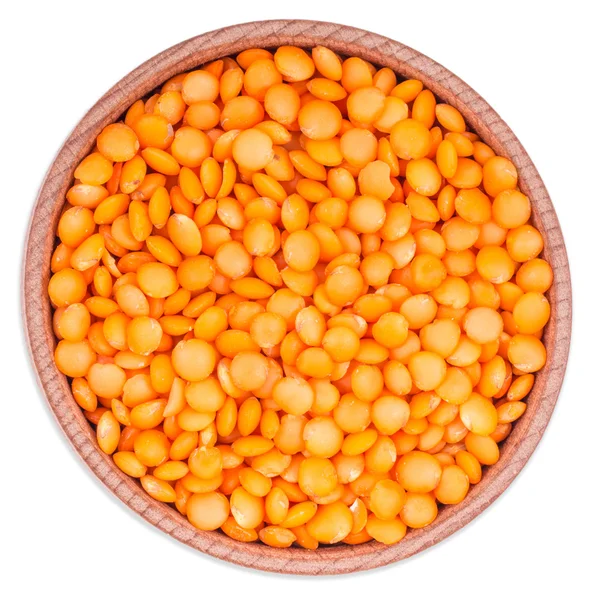Lentils in a wooden bowl isolated on white background — Stock Photo, Image