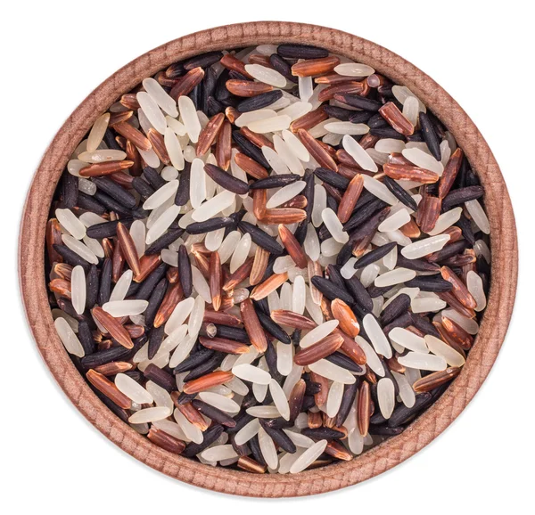 Mezcla de color arroz gourmet (marrón, rojo, salvaje) en un bowl top vie de madera — Foto de Stock