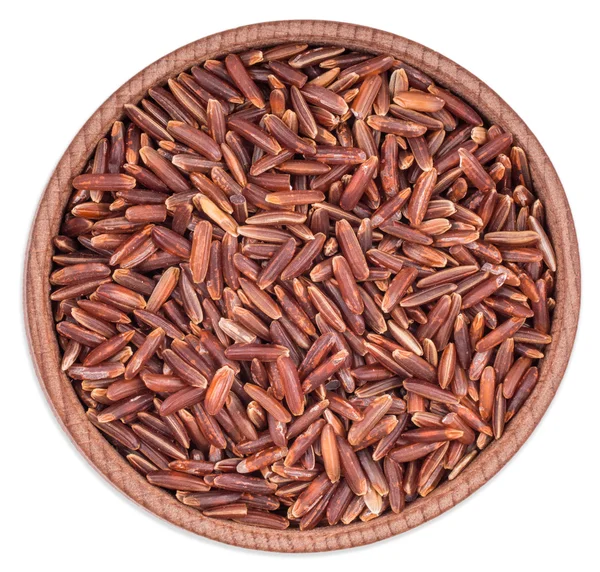 Red rice in a wooden bowl isolated on white background — Stock Photo, Image