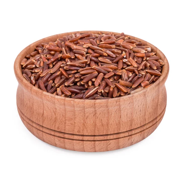 Red rice in a wooden bowl isolated on white background — Stock Photo, Image