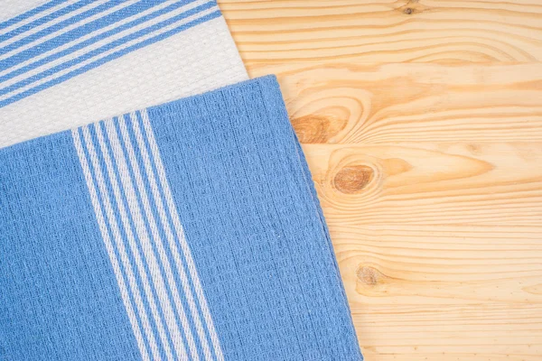 Napkin on wooden table — Stock Photo, Image