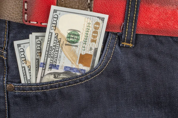 Cash in dark blue jeans pocket closeup — Stock Photo, Image