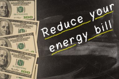 Text on blackboard with money - Reduce your energy bill clipart