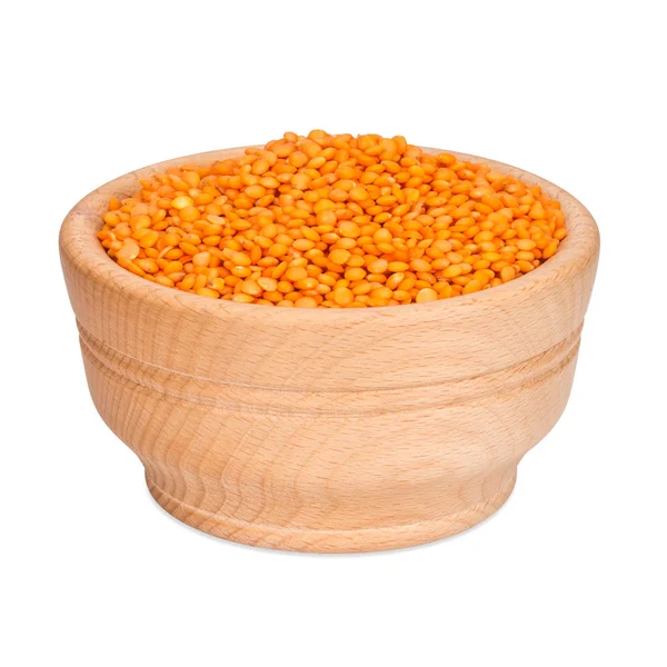 Red lentil in wooden bowl, isolated on white background — Stock Photo, Image
