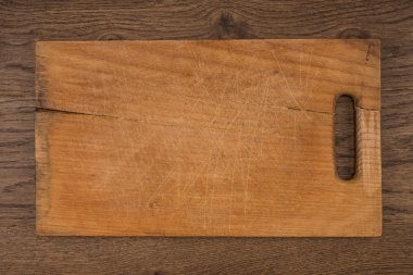 Yiyecek arka planında boş vintage kesme tahtası konsepti