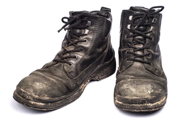 Παλιά μπότες, απομονώνονται σε λευκό φόντο. — Φωτογραφία Αρχείου