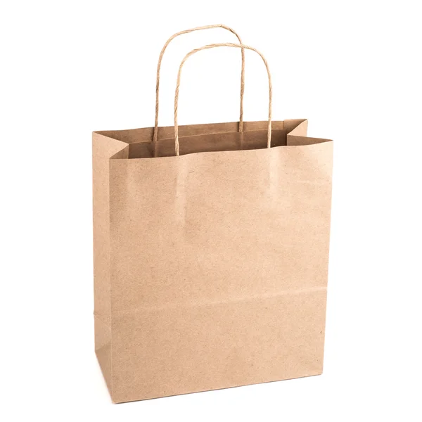 Braune Einkaufstasche mit Henkeln isoliert auf weißem Hintergrund. Stockfoto