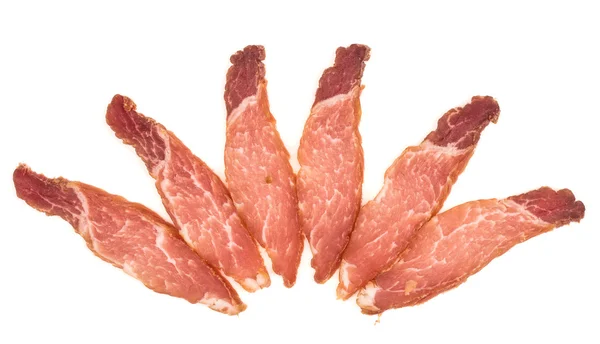 Carne ahumada sobre un fondo blanco —  Fotos de Stock