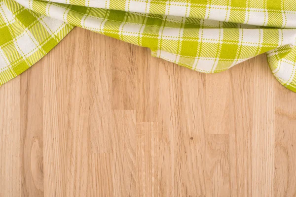 Textura textil de cocina verde y blanca sobre fondo de madera — Foto de Stock