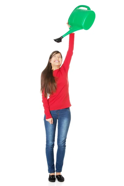 Woman holding a watering can. — Stock Photo, Image