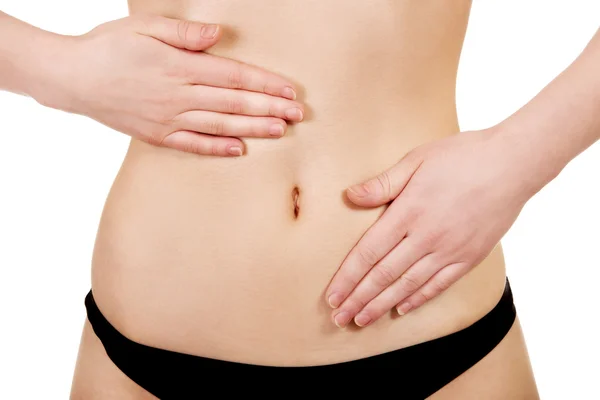 Beautiful womans belly. — Stock Photo, Image