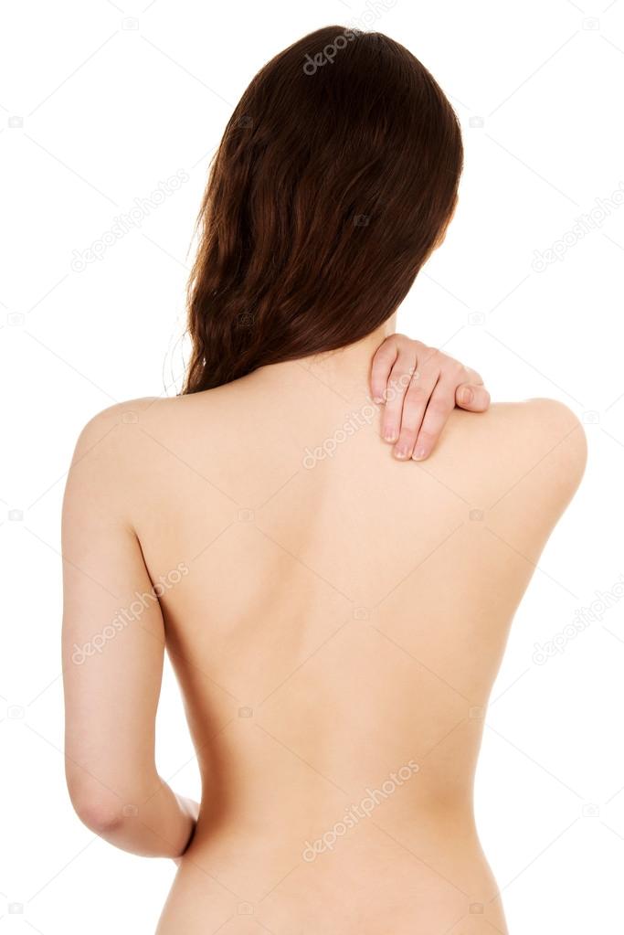 Woman holding her back.