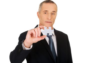 Akıllı işadamı bir bulmaca holding