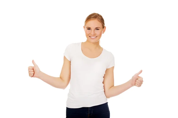Young happy woman gesturing thumbs up — Stock Photo, Image
