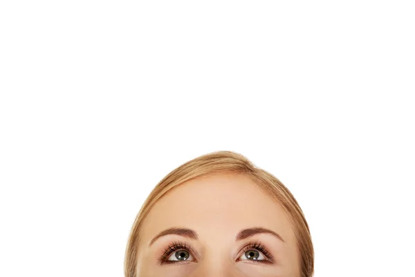 Young woman eyes looking up — Stock Photo, Image