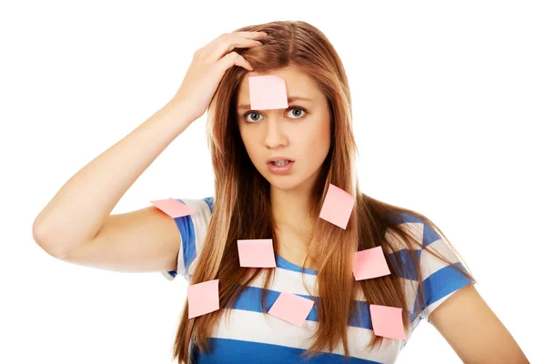 Teenage woman covered with post it notes — Stock Photo, Image