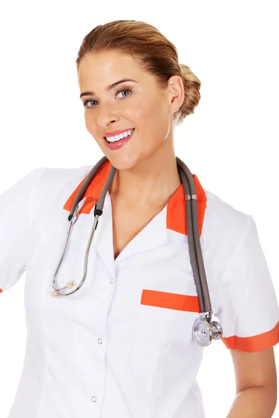 Fiatal mosoly női orvos vagy nővér — Stock Fotó