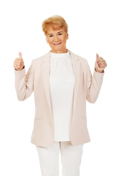 Smile elegant senior woman showing thumb up — Stock Photo, Image