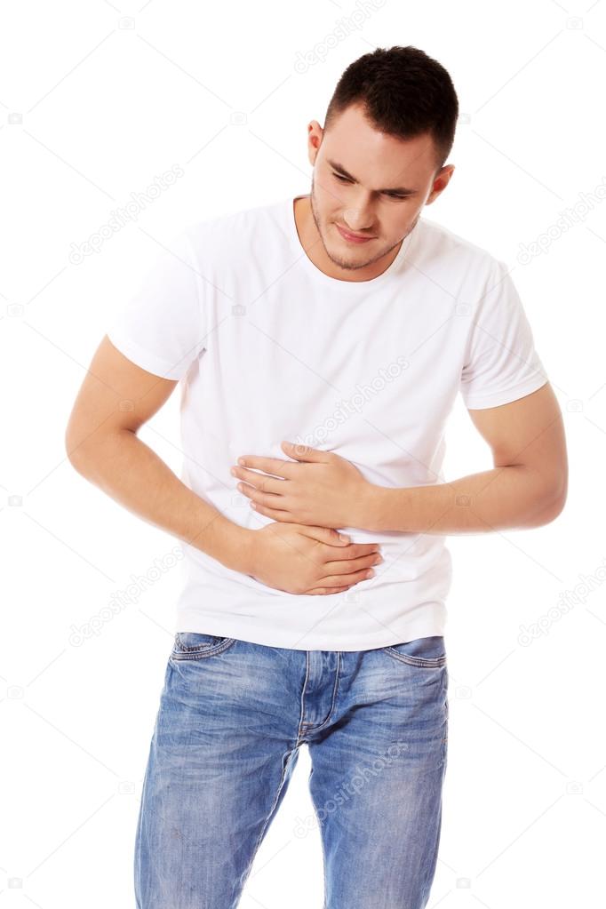 Young man with strong stomachache