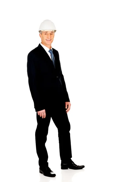 Hombre de negocios sonriente con sombrero duro —  Fotos de Stock
