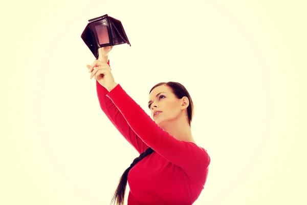 Joven estudiante sosteniendo cartera vacía — Foto de Stock