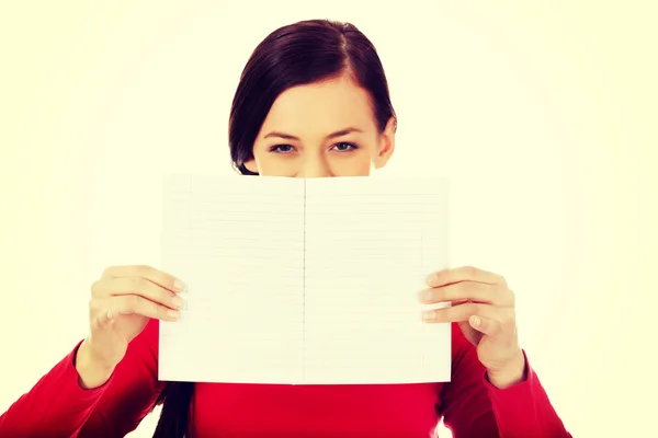 Smile young woman holding blank white banner — Stock Photo, Image