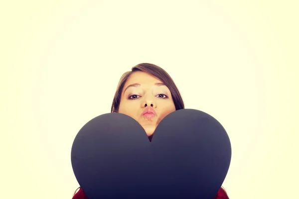 Young woman with heart made from paper. — Stock Photo, Image