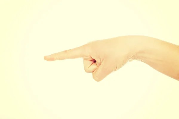 Woman finger pointing for something — Stock Photo, Image