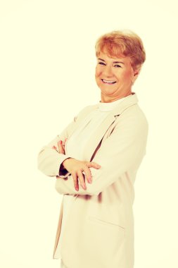 Katlanmış ellerle kadın kıdemli gülümse