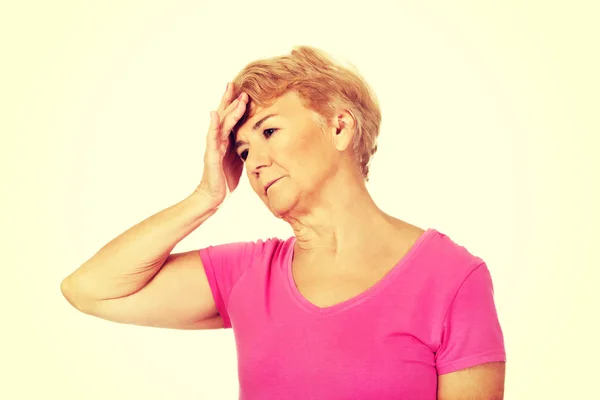 Senior woman with huge headache — Stock Photo, Image