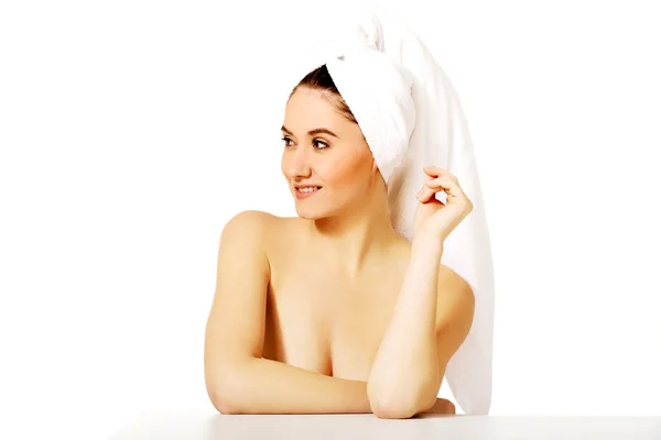 Relaxed woman with towel on head — Stock Photo, Image