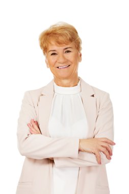 Katlanmış ellerle kadın kıdemli gülümse