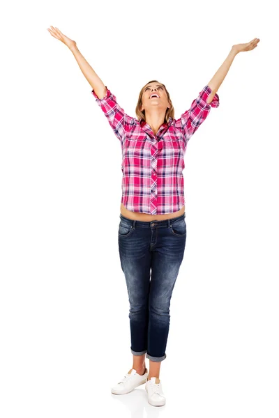 Happy blonde woman standing with hands up — Stock Photo, Image