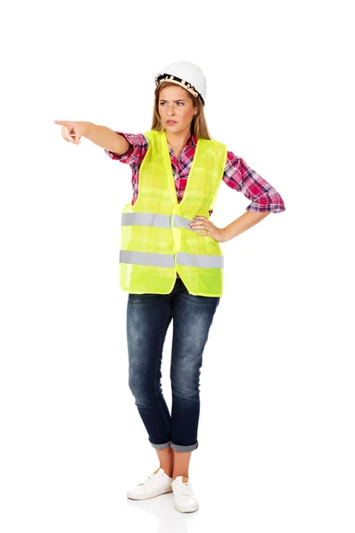 Smiling female builder in vest — Stock Photo, Image