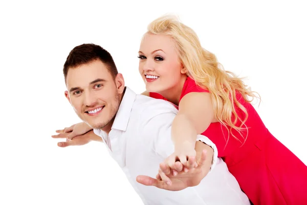 Happy young couple  gesturing flying — Stock Photo, Image