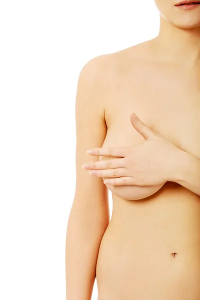 Рак молочной железы - женщина держит грудь — стоковое фото