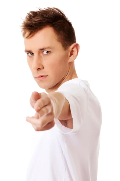 Young angry man doing a gun gesture — Stock Photo, Image