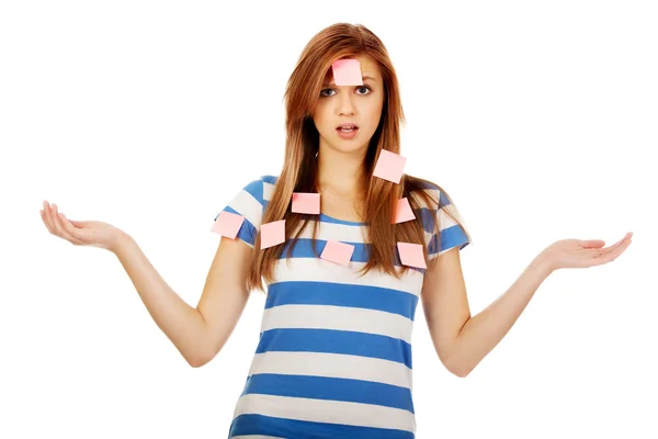 Teenage woman covered with post it notes — Stock Photo, Image