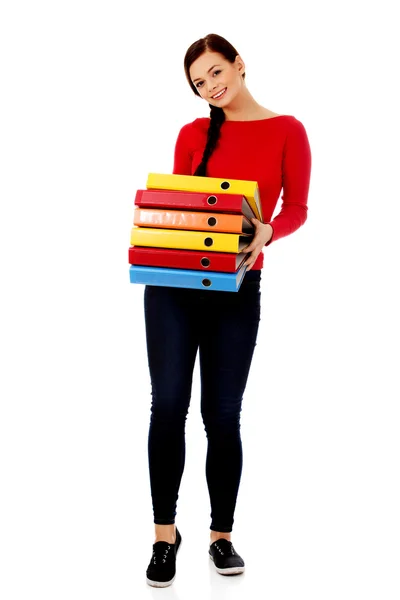 Young happy  woman holding binders — Stock Photo, Image