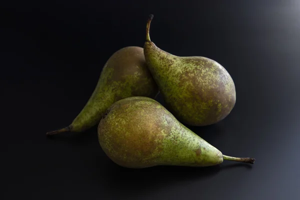 Three pears on black background — Stock Photo, Image