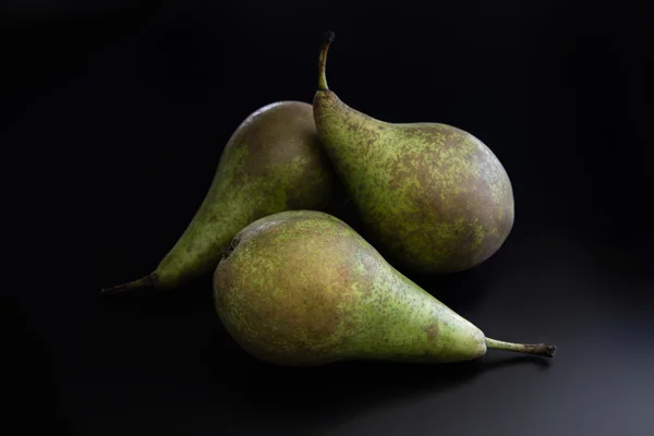 Three pears on black background — Stock Photo, Image
