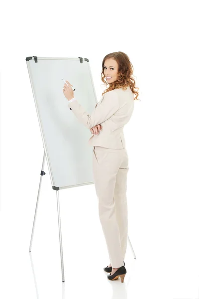 Iş kadını Flipchart yazma. — Stok fotoğraf