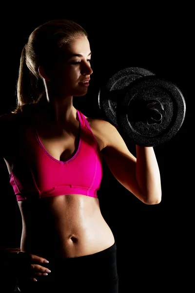 Fiatal nő nő emelő súlyzók izzad — Stock Fotó