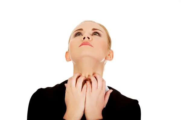 Young elegant woman scratching her neck — Stock Photo, Image