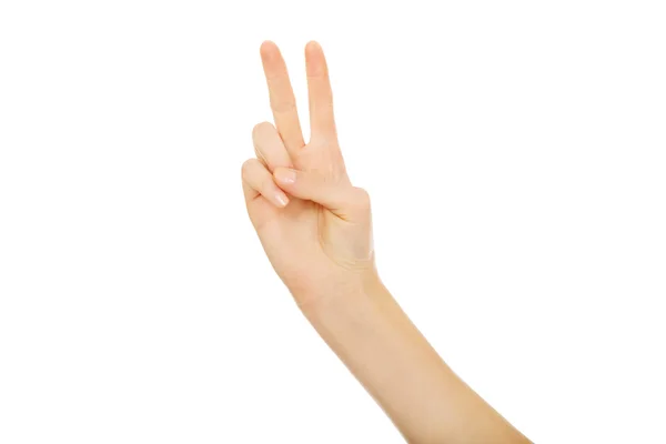 Mujer mano muestra dos dedos —  Fotos de Stock