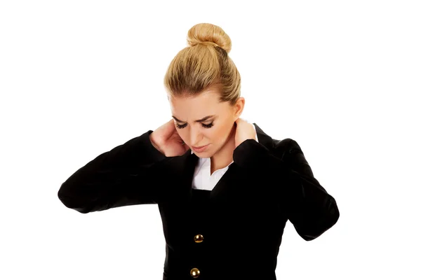 Businesswoman having huge neck pain — Stock Photo, Image